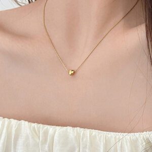 Un collier en acier inoxydable plaqué or 18k de design pendentif en forme de coeur délicat et élégant, convient aux femmes pour porter dans les fêtes ou comme cadeau pour les mères.