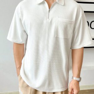 Manfinity Hypemode Chemise polo à quart de zip avec poche et patch pour homme pour l'été