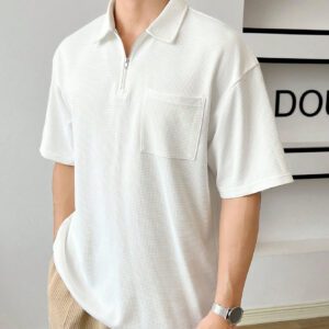 Manfinity Hypemode Chemise polo à quart de zip avec poche et patch pour homme pour l'été