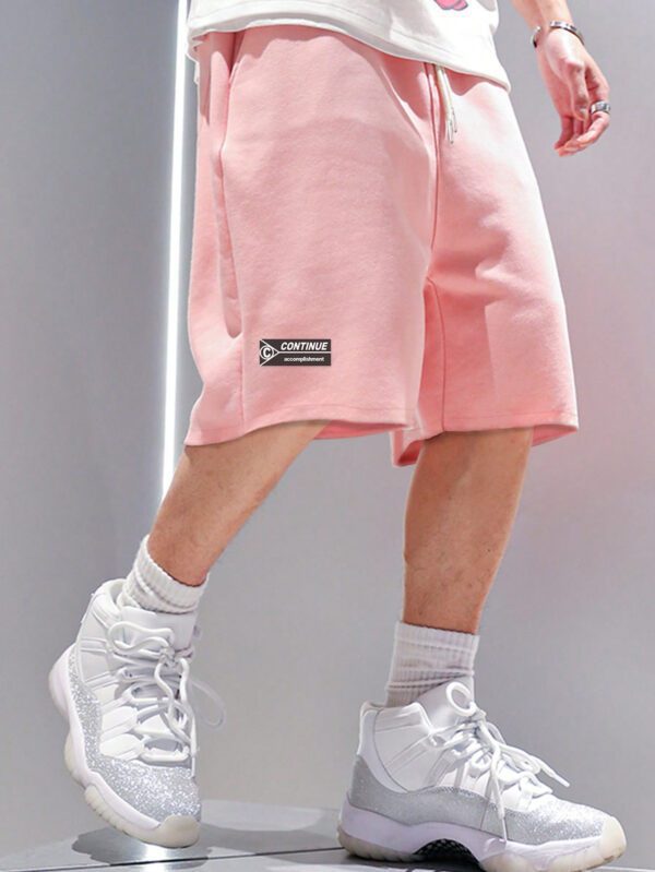 Manfinity Hypemode Shorts amples à la taille à cordon de serrage pour homme avec patchwork
