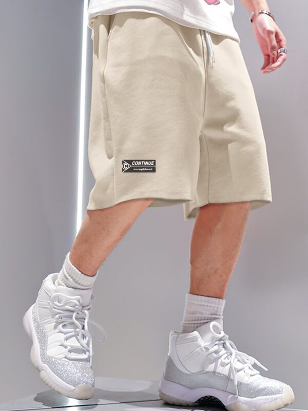 Manfinity Hypemode Shorts amples à la taille à cordon de serrage pour homme avec patchwork – Image 3