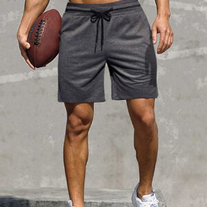 Manfinity Homme Shorts de piste pour hommes, élastique à cordon de serrage à la taille, couleur unie, décontracté pour entraînement sportif