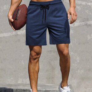 Manfinity Homme Shorts de piste pour hommes, élastique à cordon de serrage à la taille, couleur unie, décontracté pour entraînement sportif