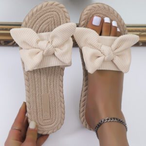 Éléments de motif d'ondulation classiques polyvalents et élégants, éléments de bande adhésive simples, chaussons à nœud papillon vert frais pour filles, décontractés et tendance, chaussures de plage à semelle plate antidérapante avec nœud papillon, pantoufles plates pour femmes pour l'extérieur en été