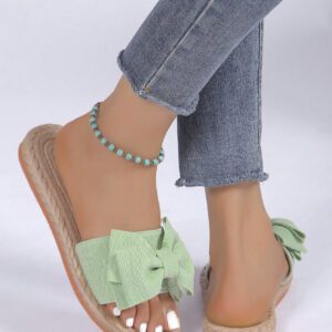 Éléments de motif d'ondulation classiques polyvalents et élégants, éléments de bande adhésive simples, chaussons à nœud papillon vert frais pour filles, décontractés et tendance, chaussures de plage à semelle plate antidérapante avec nœud papillon, pantoufles plates pour femmes pour l'extérieur en été