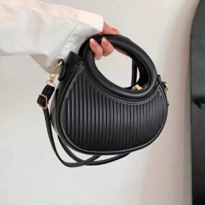 Sac à main de femme nouvelle mode design de niche noir, dame douce de style français pour les déplacements et les rendez-vous, sac à main porté à la main ou en bandoulière, sac à bandoulière rond de mode avec rayures et gaufrage, sacs à main avec double poignée, sacs à main insolites