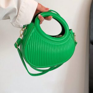 Sac à main de femme nouvelle mode design de niche noir, dame douce de style français pour les déplacements et les rendez-vous, sac à main porté à la main ou en bandoulière, sac à bandoulière rond de mode avec rayures et gaufrage, sacs à main avec double poignée, sacs à main insolites