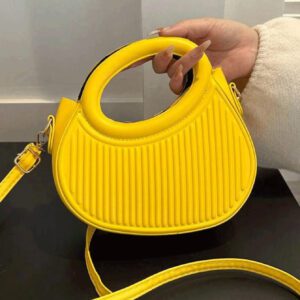 Sac à main de femme nouvelle mode design de niche noir, dame douce de style français pour les déplacements et les rendez-vous, sac à main porté à la main ou en bandoulière, sac à bandoulière rond de mode avec rayures et gaufrage, sacs à main avec double poignée, sacs à main insolites