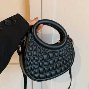 Sac à main de femme nouvelle mode design de niche noir, dame douce de style français pour les déplacements et les rendez-vous, sac à main porté à la main ou en bandoulière, sac à bandoulière rond de mode avec rayures et gaufrage, sacs à main avec double poignée, sacs à main insolites