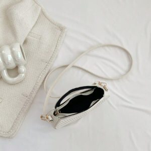 Sac à main de femme nouvelle mode design de niche noir, dame douce de style français pour les déplacements et les rendez-vous, sac à main porté à la main ou en bandoulière, sac à bandoulière rond de mode avec rayures et gaufrage, sacs à main avec double poignée, sacs à main insolites