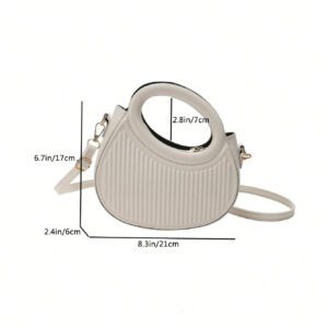 Sac à main de femme nouvelle mode design de niche noir, dame douce de style français pour les déplacements et les rendez-vous, sac à main porté à la main ou en bandoulière, sac à bandoulière rond de mode avec rayures et gaufrage, sacs à main avec double poignée, sacs à main insolites