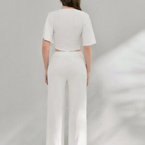 SHEIN Ensemble d'été deux pièces, haut torsadé à manches à volants et en tissu texturé avec pantalon large taille haute