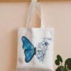 Sac à provisions avec imprimé floral et papillon, sac d'école. Capacité importante, portable, pliable, classique décontracté. Convient aux adolescentes, femmes, étudiantes. Parfait pour la rentrée scolaire, le premier jour d'école, le collège, le lycée, les courses, les vacances, l'université. Sac papillon tendance