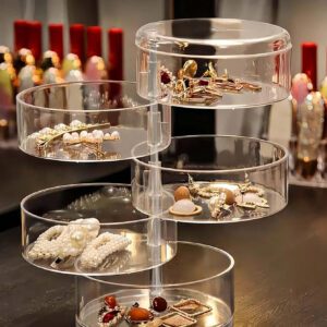 1 pièce Boîte à bijoux rotative transparente, boîte de rangement multifonctionnelle pour cosmétiques, organisateur de comptoir de coiffeuse, boîte de rangement pour accessoires, présentoir à cosmétiques multicouche, décoration de maison, décoration de chambre, accessoires de salle de bain, convient pour les bracelets, boucles d'oreilles, bagues, colliers, broches, pinces à cheveux, bandeaux, montres, houppettes, etc.