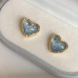 1 paire de boucles d'oreilles élégantes et minimalistes en forme d'œil de chat avec un design de sable pailleté et un bord doré, idéal pour la Saint-Valentin