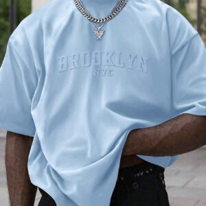 Manfinity Homme T-shirt casual à manches courtes pour hommes en été, col rond, avec impression en relief de lettres. Streetwear