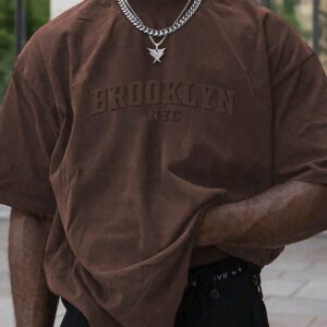 Manfinity Homme T-shirt casual à manches courtes pour hommes en été, col rond, avec impression en relief de lettres. Streetwear