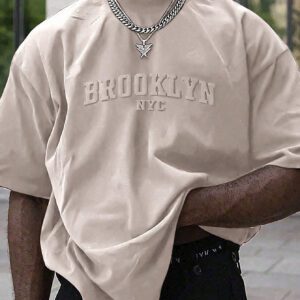 Manfinity Homme T-shirt casual à manches courtes pour hommes en été, col rond, avec impression en relief de lettres. Streetwear
