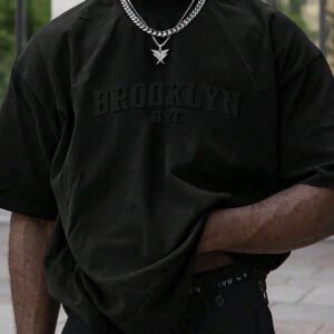 Manfinity Homme T-shirt casual à manches courtes pour hommes en été, col rond, avec impression en relief de lettres. Streetwear
