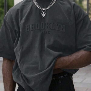 Manfinity Homme T-shirt casual à manches courtes pour hommes en été, col rond, avec impression en relief de lettres. Streetwear