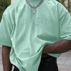 Manfinity Homme T-shirt casual à manches courtes pour hommes en été, col rond, avec impression en relief de lettres. Streetwear