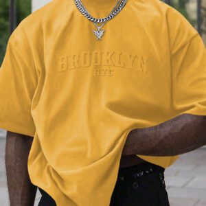 Manfinity Homme T-shirt casual à manches courtes pour hommes en été, col rond, avec impression en relief de lettres. Streetwear