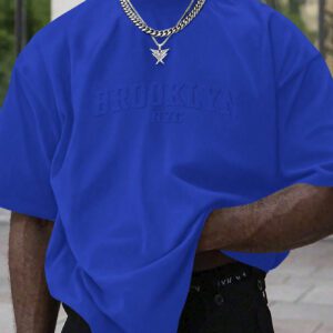 Manfinity Homme T-shirt casual à manches courtes pour hommes en été, col rond, avec impression en relief de lettres. Streetwear