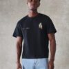 SUMWON T-shirt à manches courtes avec imprimé graphique de verre de fenêtre, coupe rétrécie