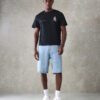 SUMWON T-shirt à manches courtes avec imprimé graphique de verre de fenêtre, coupe rétrécie – Image 3