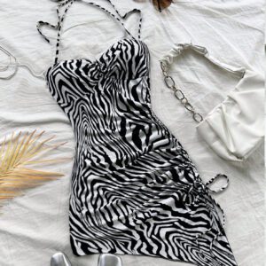 SHEIN WYWH Robe moulante mini à col ras-du-cou sans manches avec nœud papillon, ourlet asymétrique en impression zébré noir et blanc, style vacances mignon, vêtement d'extérieur mode hiver