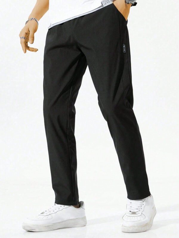 Pantalon pour hommes avec cordon de serrage à la taille et poches zippées, design – Image 7