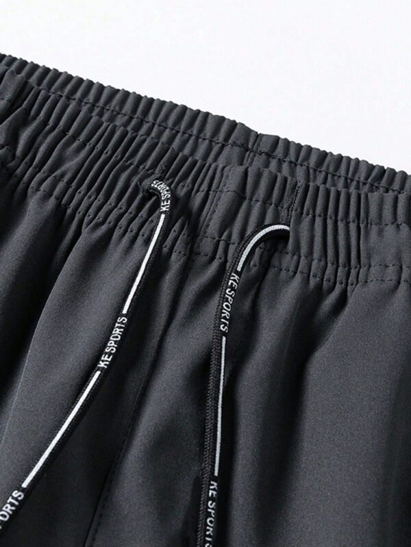 Pantalon pour hommes avec cordon de serrage à la taille et poches zippées, design – Image 10