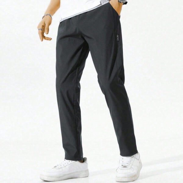 Pantalon pour hommes avec cordon de serrage à la taille et poches zippées, design – Image 16
