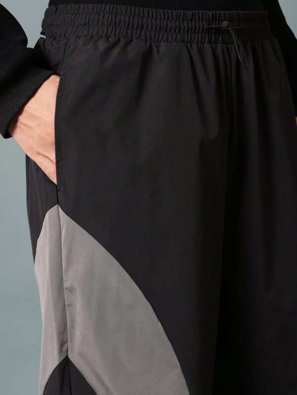 SUMWON Pantalon parachute coupe droite couleur bloc – Image 8