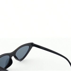 Des lunettes de mode noires féminines unisexes à l'encre noire avec un design œil de chat triangulaire tendance. Petits montures pour visages ronds et allongés