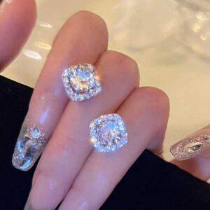 1 paire de clous d'oreilles en zircone incrustés de cuivre, simples, à la mode, de luxe et rares, pour usage quotidien des femmes