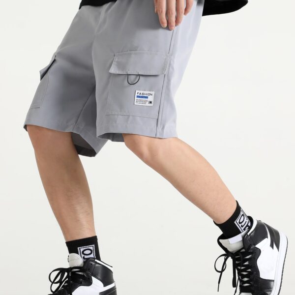 Manfinity Hypemode Shorts cargo amples pour hommes avec lettrage et poches à rabat, taille à cordon