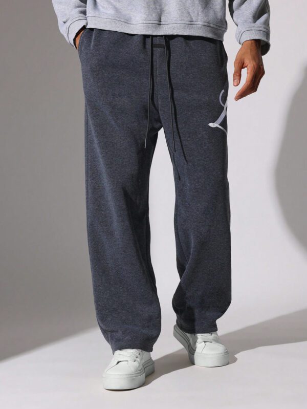 SUMWON Pantalon de survêtement à entrejambe tombante avec cordons et motifs brodés – Image 2