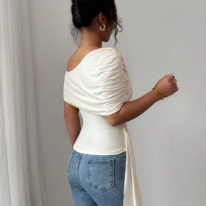 Elenzga T-shirt élégant slim asymétrique à volants de couleur unie pour femme, été