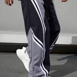 Manfinity EMRG Pantalon décontracté simple et de mode pour hommes, avec un bloc de couleurs. Convient pour l'été