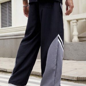 Manfinity EMRG Pantalon décontracté simple et de mode pour hommes, avec un bloc de couleurs. Convient pour l'été