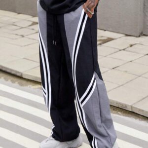 Manfinity EMRG Pantalon décontracté simple et de mode pour hommes, avec un bloc de couleurs. Convient pour l'été