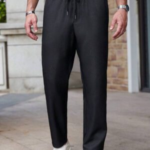 Manfinity RelaxMax Pantalon mode couleur unie pour hommes, adapté pour l'été
