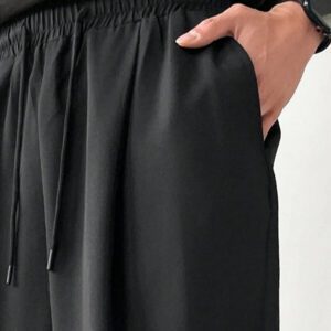 Manfinity EMRG Pantalon casual ample à poche et lien devant simple pour homme, à porter au quotidien