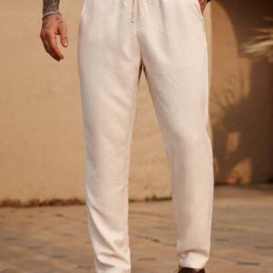 Manfinity RSRT Pantalon décontracté pour hommes, couleur unie, cordon de serrage à la taille, poches inclinées. Pantalon blanc pour hommes. Pantalon décontracté pour hommes