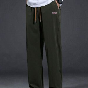 Pantalon pour hommes à taille avec cordon de serrage, poches inclinées, couleur unie, coupe décontractée