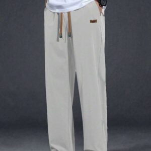 Pantalon pour hommes à taille avec cordon de serrage, poches inclinées, couleur unie, coupe décontractée