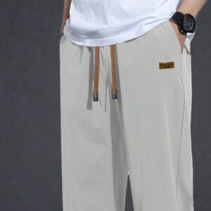 Pantalon pour hommes à taille avec cordon de serrage, poches inclinées, couleur unie, coupe décontractée