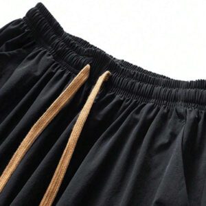 Pantalon pour hommes à taille avec cordon de serrage, poches inclinées, couleur unie, coupe décontractée