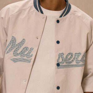 Musero Top boutonné à manches courtes en nylon avec slogan "Musero"